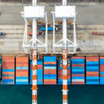 Container ship with cargo in a port.