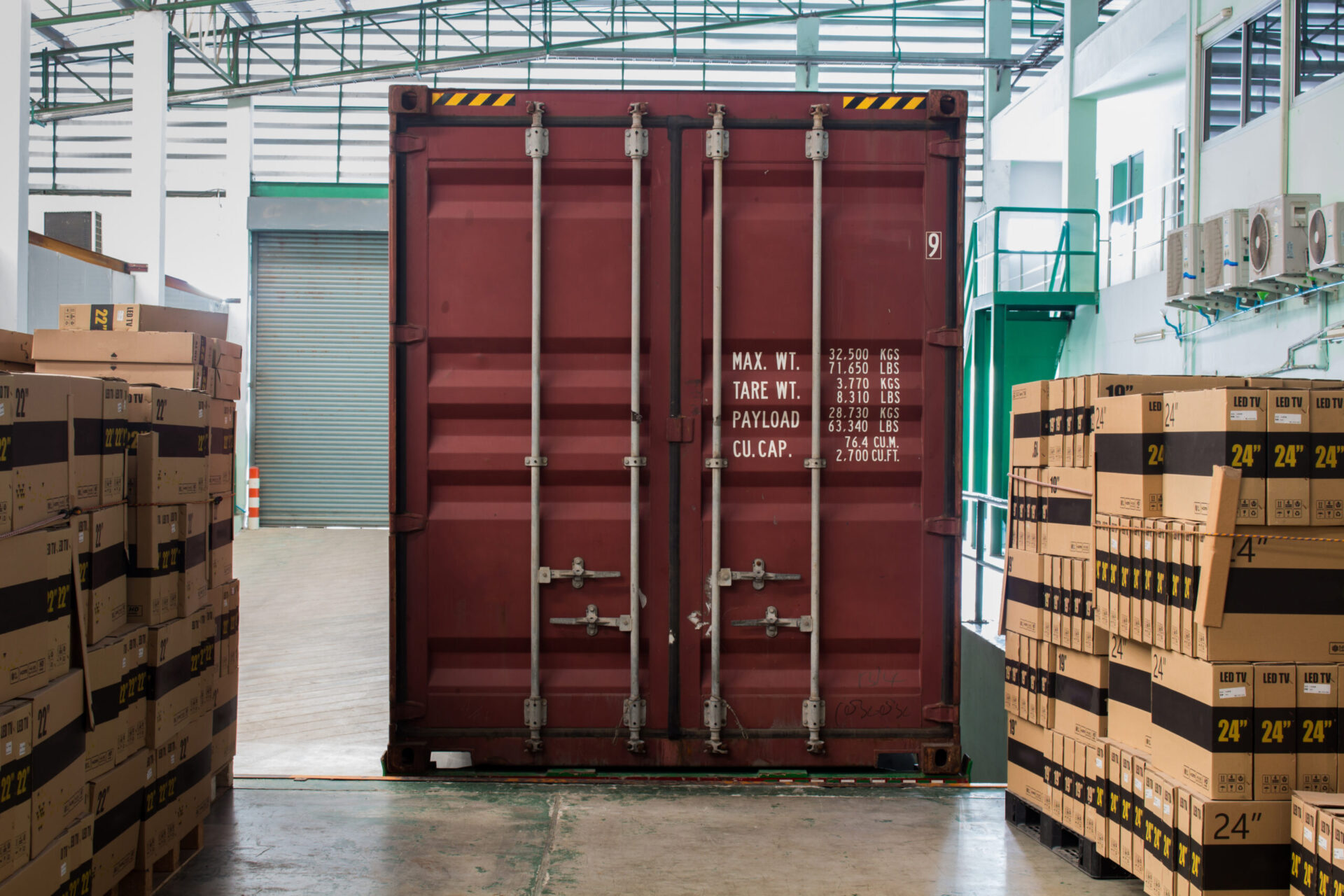 The container inside warehouse on shipment area for LCL consolidation.