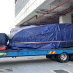 Manufacturing plant relocation from Singapore to Malaysia.