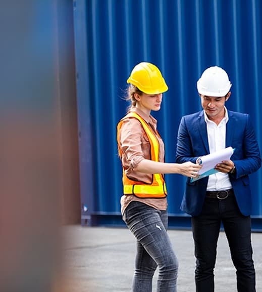 cargo-check dock workers reviewing cargo