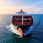 Container ship at sea representing global freight movement amid rising geopolitical risk