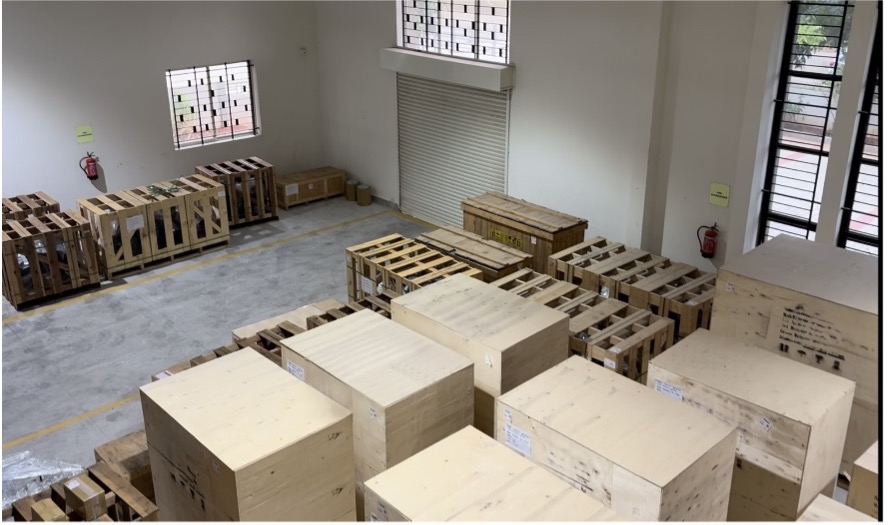 Cargo crates and pallets inside Dimerco India warehouse in Bangalore, supporting BIS Certification compliance and customs clearance processes
