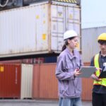 Trade compliance professionals reviewing shipment documentation for IEEPA refund recovery preparation