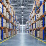Modern warehouse facility with high-bay storage racks, palletized inventory, and organized distribution space, representing warehousing in China and Southeast Asia, supply chain management, and third-party logistics services.